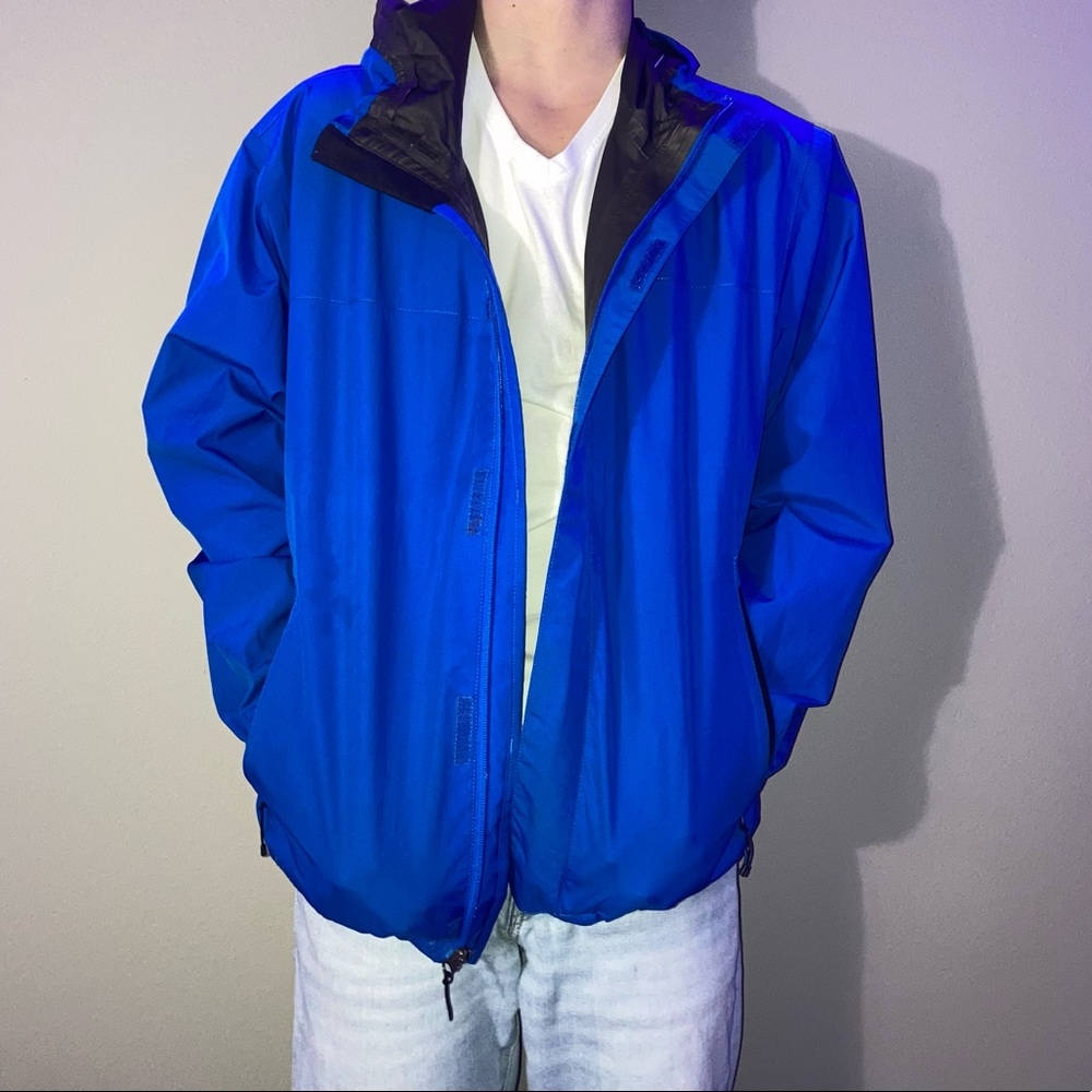Bright blue windbreaker jacket